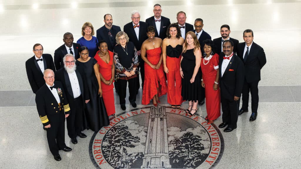 Mac McMichael stands with his fellow award recipients