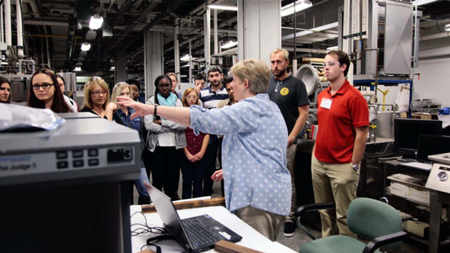 Dr. Jan Ballard speaks to group on ZTE lab tour