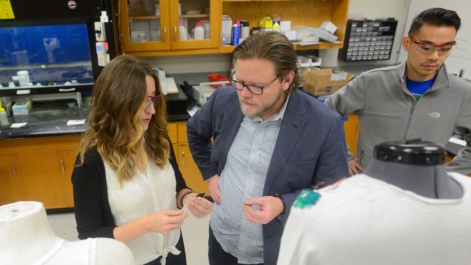 Researchers working in lab