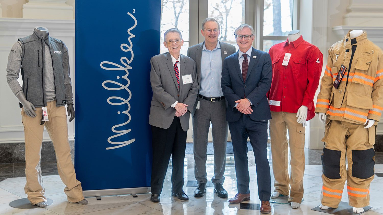 Roger Barker, Halsey Cook and David Hinks stand together during the naming ceremony on April 4th.