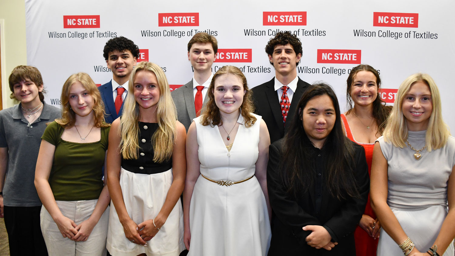 Ten smiling students