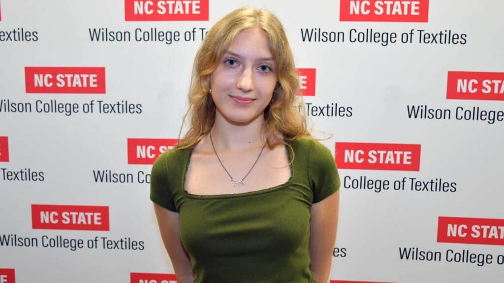 A student, Maddie White, smiling.