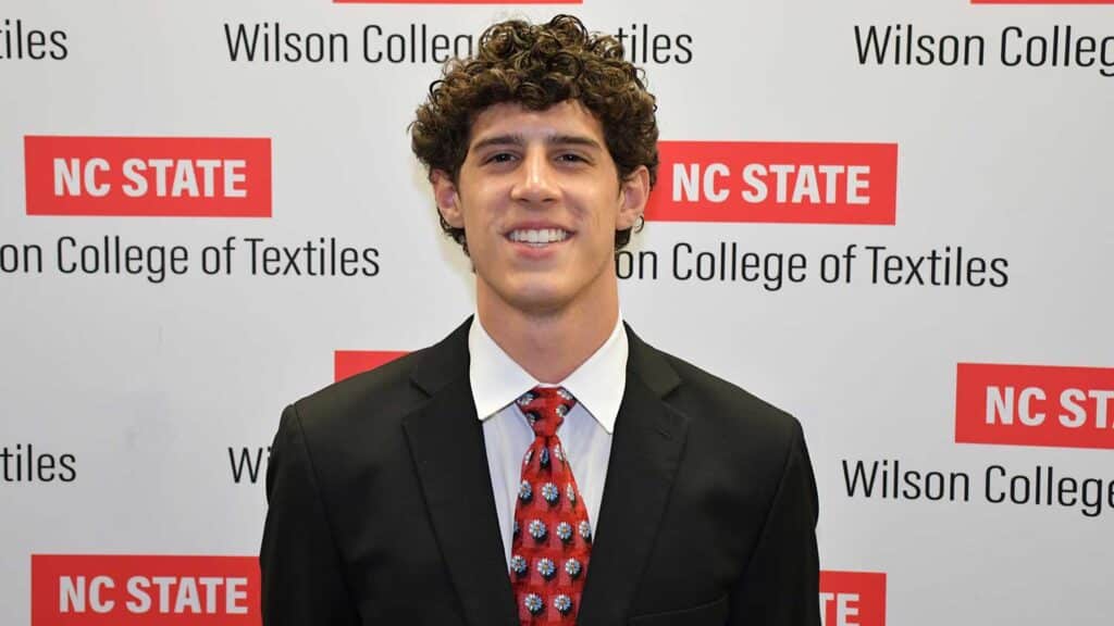 A student, Jesse Toscano, smiling.