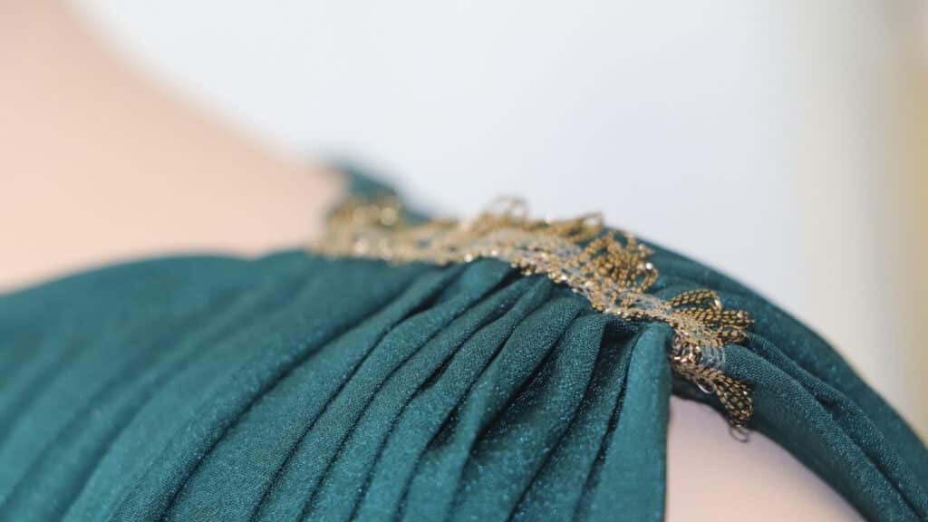 A close up on the sleeve detailing on one of Olivia Jurney's Selene Tops.