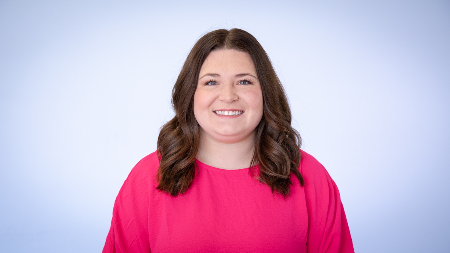 A smiling headshot of Jenna Clayton.