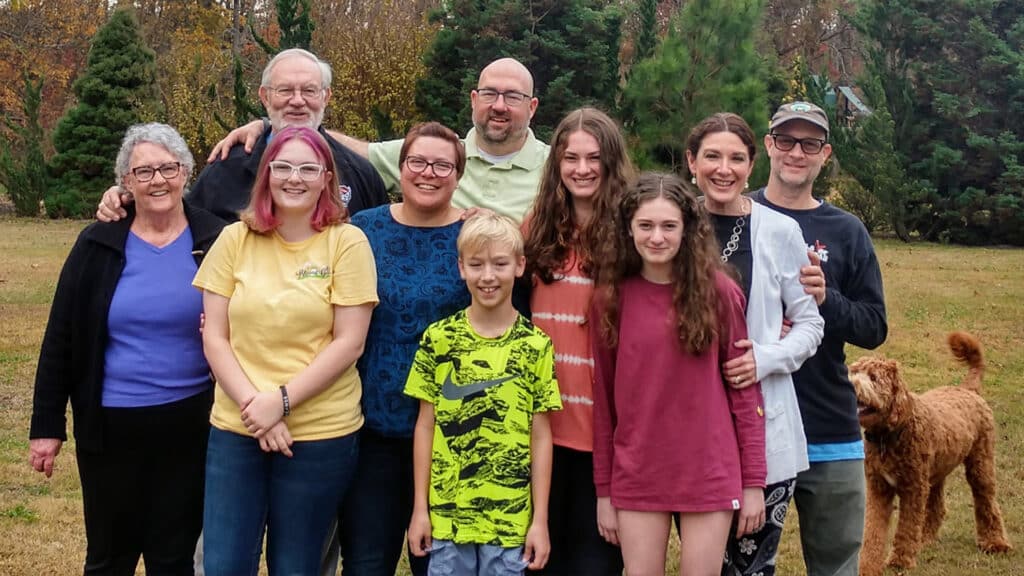 Michael Ward stands alongside his family