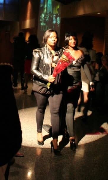 Jessica Singleton walking with red roses.