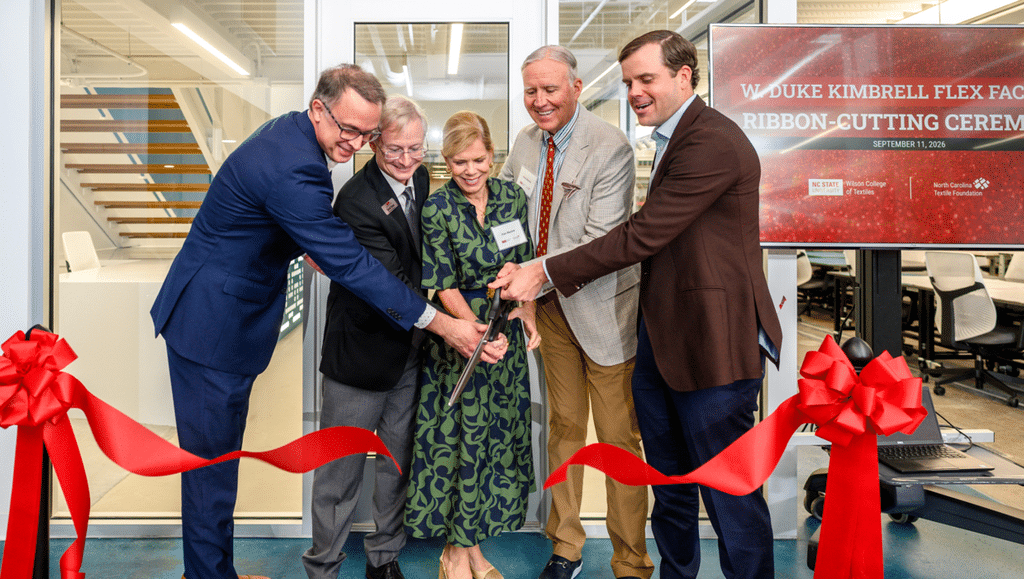 Dean Hinks, Michael Ward and members of the Kimbrell Foundation cut the ribbon to officially open the new Flex Factory.