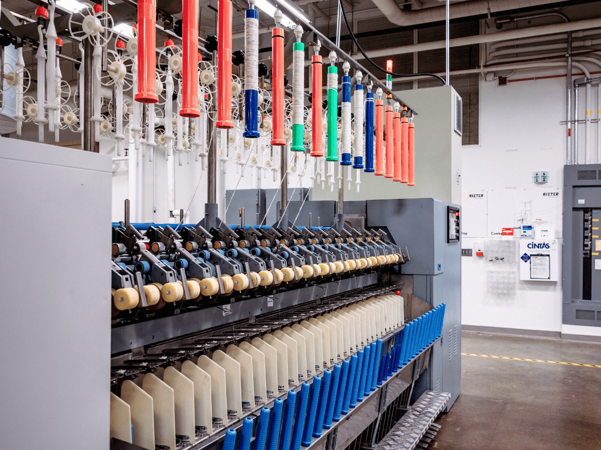 Wet ring yarn spinning frame.